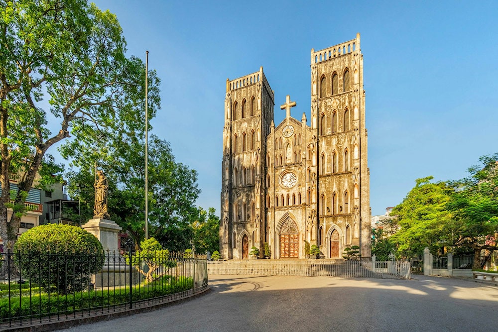 St. Joseph’s Cathedral impresses with its neo-Gothic architecture and peaceful atmosphere in the Old Quarter